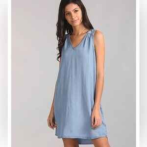 Gap Light Blue Denim Sleeveless V Neck Mini Shift Dress features a tie back